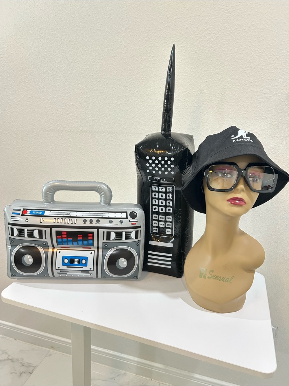 Kangol Inspired Bucket Hat with Oversized Glasses and Inflatables Props